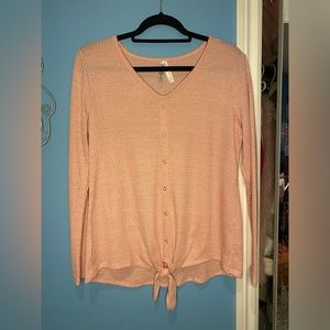 Woman’s pink long sleeve shirt